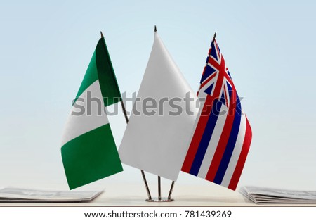 Flags of Nigeria and Hawaii with a white flag in the middle