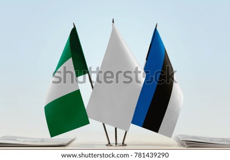 Flags of Nigeria and Estonia with a white flag in the middle