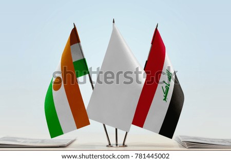 Flags of Niger and Iraq with a white flag in the middle