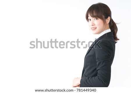 business woman in suit sitting in office