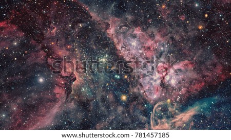Space of night sky with nebula and stars. Elements of this image furnished by NASA.