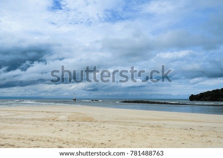 sea sand  blue sky and storm