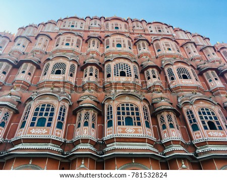 Many tiny lovely window of the Hawa mahal,the palace of winds in Jaipur India