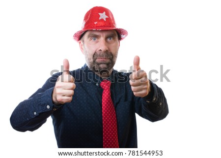 A man with a beard in a red hat