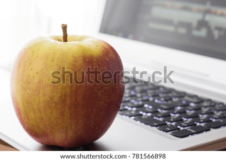 Apple on a laptop