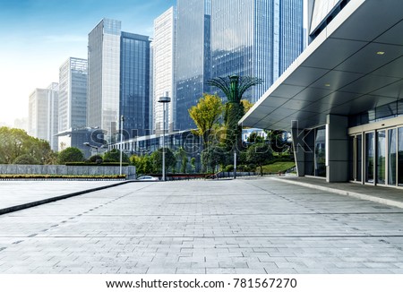 Panoramic skyline and buildings with empty concrete square floor Royalty-Free Stock Photo #781567270