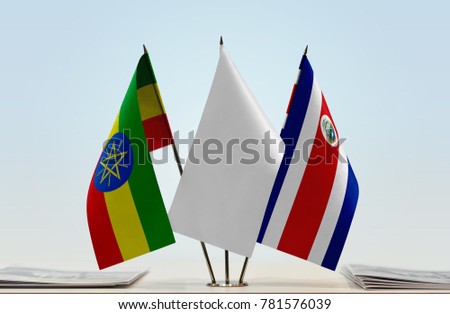 Flags of Ethiopia and Costa Rica with a white flag in the middle