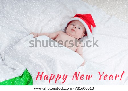 Babies are in Santa Claus hats. New Year and Christmas card