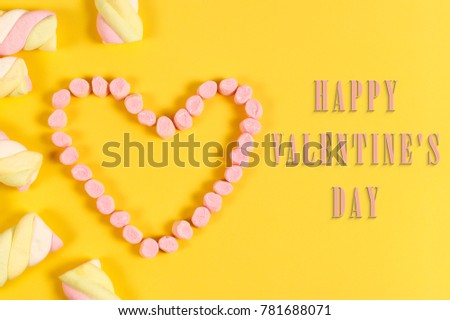 Text valentine's day in the Heart shape from sweets. love concept on yellow background