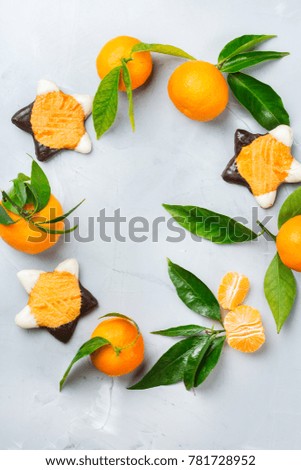 Food and drink, holidays concept. Christmas new year cookies wreath with tangerine. Copy space top view flat lay background