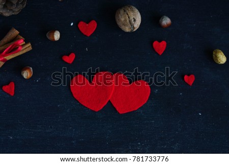 red heart out of felt on a black background . love. relationship. Valentine's day