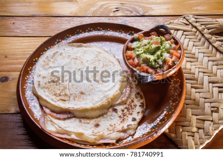 Authentic mexican guacamole and sincronizada with ham
