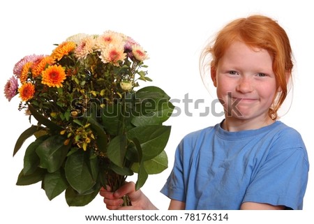 Portrait of a young girl holding a bunch of flowers