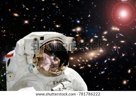 Astronaut and light. Science theme.  The elements of this image furnished by NASA.
