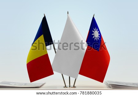 Flags of Chad and Taiwan with a white flag in the middle