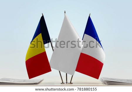 Flags of Chad and France with a white flag in the middle