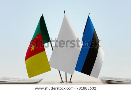 Flags of Cameroon and Estonia with a white flag in the middle