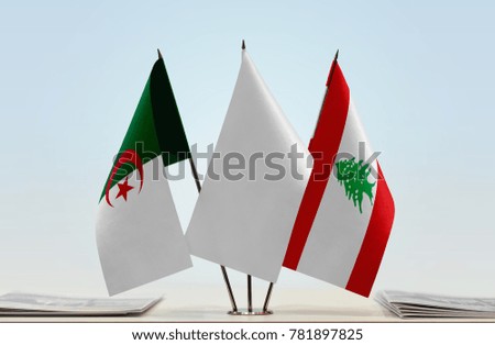 Flags of Algeria and Lebanon with a white flag in the middle