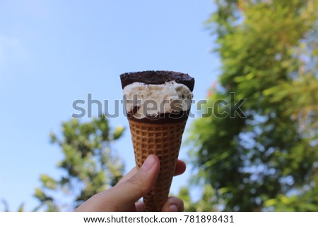 A chocolate ice-cream on nature background