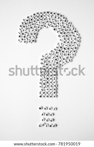 A word writing text showing concept of What Are You Doing question made of white plastic beads with black letters for Business case on the white background with space