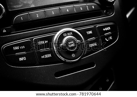 Center console. Detail interior of car. control panel, dashboard, black and white picture. 