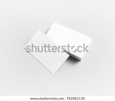 Photo of blank business cards on paper background. For design portfolios.