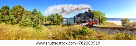 Historical German steam train in spring, Rugen, Germany, panoramic image