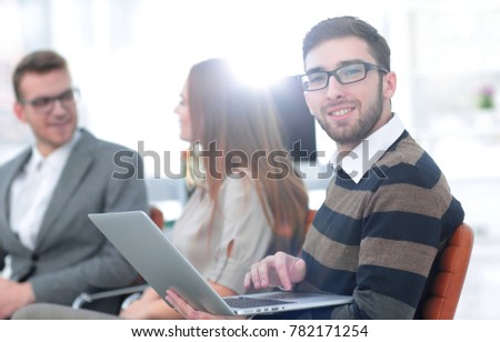 closeup.man working on laptop