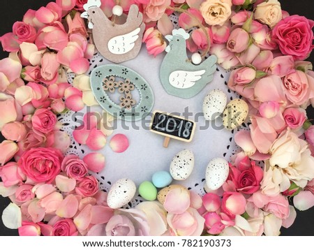 flower easter with rustic wooden hens. easter 2018. shabby roses and petals fr easter 2018