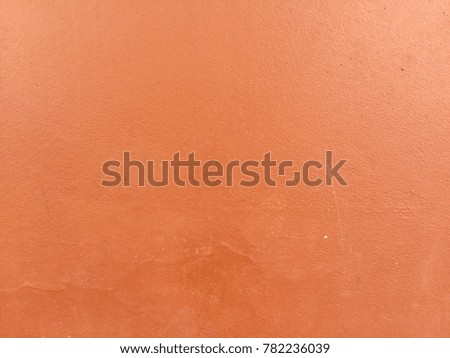 Vintage orange concrete wall background