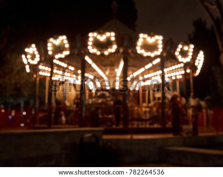 Fun fair and night . Fun fair and night. Beautiful bright carousel in park at night in winter