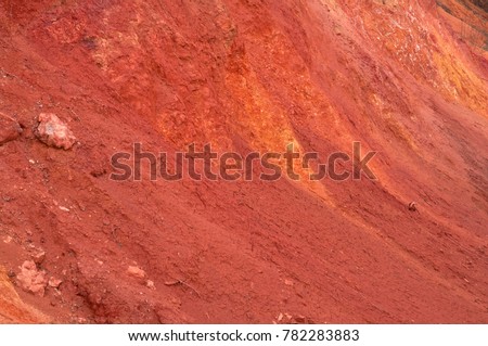 Abandoned red colored land similar to planet Mars' surface