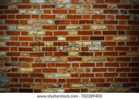 Old cracked rocks and bricks wall texture