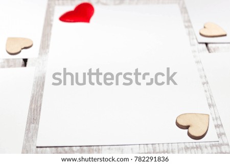 Hearts and love on a wooden background