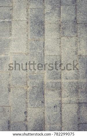 Old paving slabs and tiles texture background