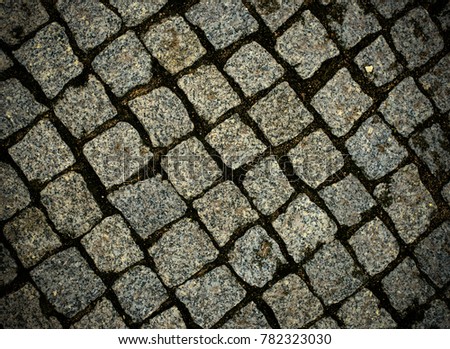 Old paving tiles background texture