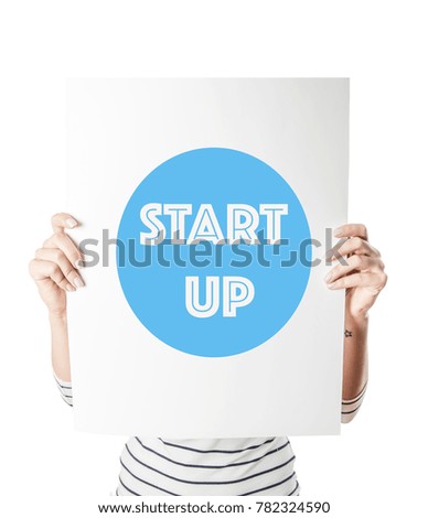 Start up Placard on a woman's hand
