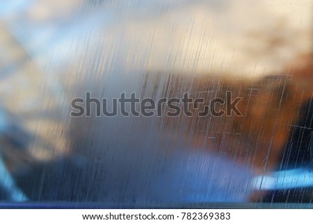 scratched car window Royalty-Free Stock Photo #782369383