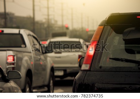 Cars jammed with traffic jams on rush hour in the morning with rain.