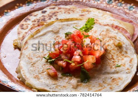 Authentic mexican sincronizada with pico de gallo sauce