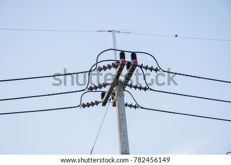 The electric pole with clear blue sky