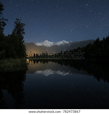 reflection of mountains and stars