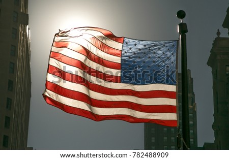 American flag with sunlight background at Chicago City