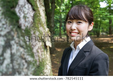 Smiling job-hunting student in suit 