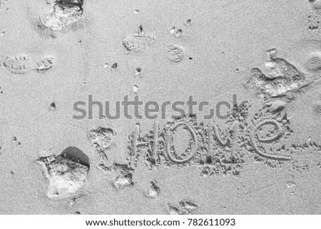 Beautiful drawing on the sand of the sea background