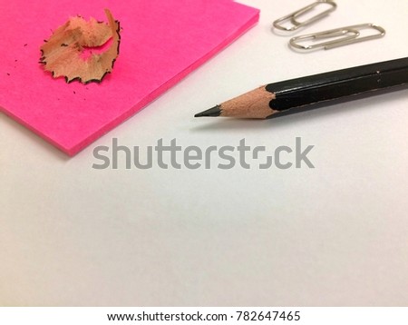Close up pencil pink paper clips on white background for work art and gift card or student use at school