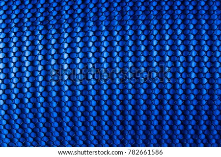 Blue background with black grid pattern