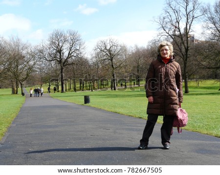 Woman walking in Hyde Park