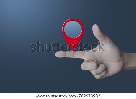 Map pin location button on finger over light gradient blue background, Map pointer navigation concept