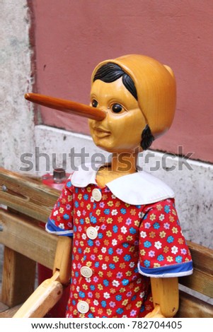 A smiling Pinocchio, the italian wooden puppet